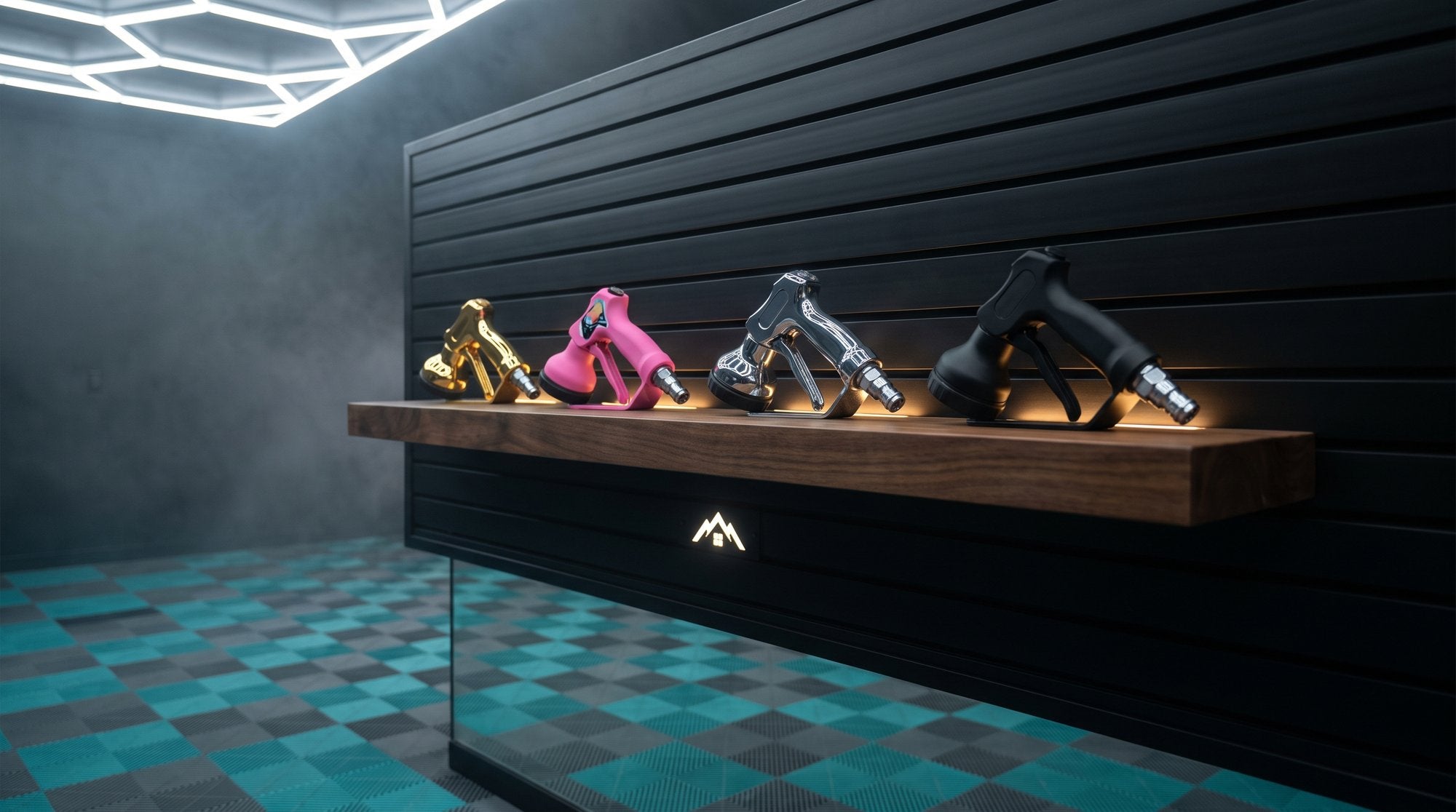Four Arsenal finishes displayed on a lit collector shelf